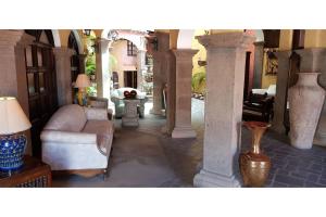 Гостиная зона в Hotel Boutique Posada De Las Flores Loreto
