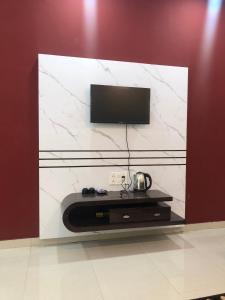 Μια τηλεόραση ή/και κέντρο ψυχαγωγίας στο Matoshree Green Stay Sariska