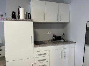 Kuchyň nebo kuchyňský kout v ubytování Air Apartments 15