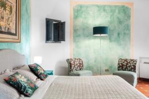 Кровать или кровати в номере Hotel Stefania Boutique Hotel by the Beach