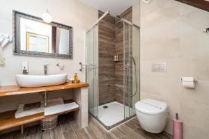 Koupelna v ubytování B&B Villa Sumrak Plitvica Rooms + 37 fotografií