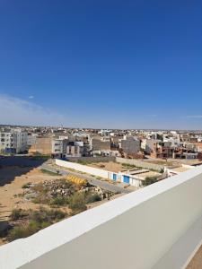a view of a city from a balcony at Residence Rahma 