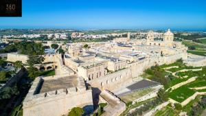 Nespecifikovaný výhled na destinaci Mdina nebo výhled na město při pohledu z prázdninového domu
