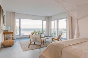 Postel nebo postele na pokoji v ubytování Villa Santorini + 37 fotografií