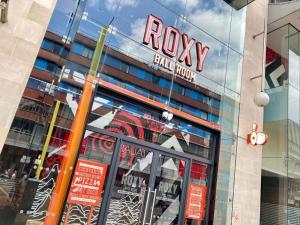a facade of a building with a rolex sign on it at City Center Leicester in Leicester