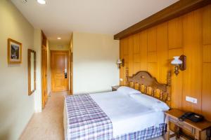 Abba Ordino Babot Hotel客房内的一张或多张床位