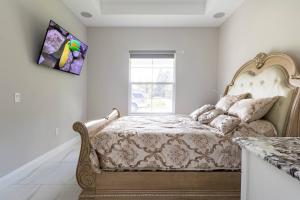 a bedroom with a bed and a window at Voyager in Merritt Island