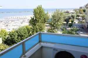 a balcony with a view of the beach at Residence Altamarea in San Mauro a Mare