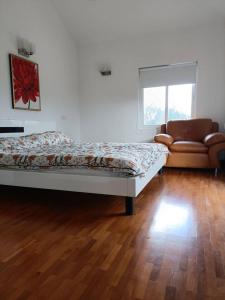 Кровать или кровати в номере Sakthi villa