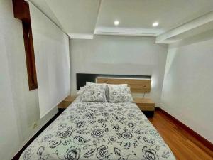 Ένα ή περισσότερα κρεβάτια σε δωμάτιο στο Artza Suite - Apartamento recién reformado