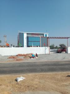 a building on the side of a street at Buddha Resort hotel & restaurant,Aurangabad in Aurangābād