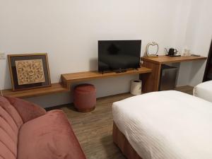 TV a/nebo společenská místnost v ubytování Lukang Inn