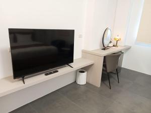 TV a/nebo společenská místnost v ubytování Lukang Inn + 31 fotografií