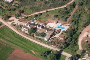 an aerial view of a house on a hill at Fazendinha - Tavira - Spacious and tranquil in Tavira