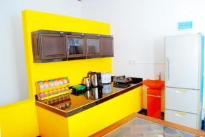 Virtuvė arba virtuvėlė apgyvendinimo įstaigoje villa surendra