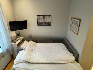 Postel nebo postele na pokoji v ubytování Super Central, 2 min from Central Station, 1-4pers