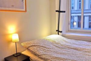 Postel nebo postele na pokoji v ubytování Super Central, 2 min from Central Station, 1-4pers