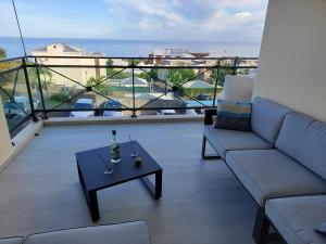 Beau T3 Litchi vue océan piscine的休息区