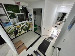 an overhead view of a staircase in a house at Hotel SG in Doradal