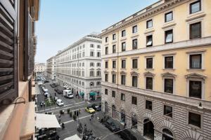 Nespecifikovaný výhled na destinaci Řím nebo výhled na město při pohledu z hotelu