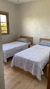 Katil atau katil-katil dalam bilik di Appartement Luxueux, 2 chambres, à 300m de la Gare de train