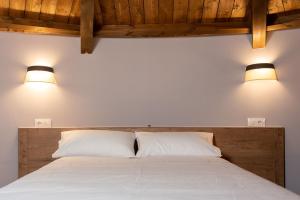 Ein Bett oder Betten in einem Zimmer der Unterkunft Pallozas Turísticas Ridicodias - A Vieira