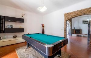 a living room with a pool table in it at Amazing Home In Siracusa With House A Panoramic View in Siracusa
