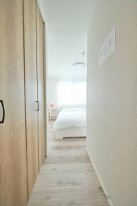 A bed or beds in a room at 清風小築