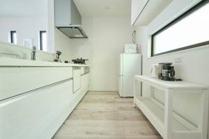A kitchen or kitchenette at 清風小築