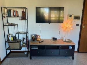 a desk in a room with a star on the wall at Civico 14 a Bologna in Castel Maggiore