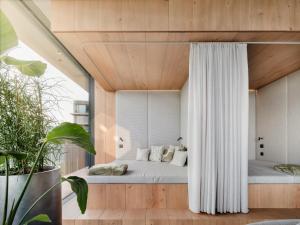 Letto o letti in una camera di Loxone Campus