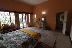 Ένα ή περισσότερα κρεβάτια σε δωμάτιο στο Claridge Heights 308