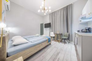 Posteľ alebo postele v izbe v ubytovaní JS Modern Downtown Studios-Self Check-in