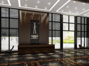 a lobby with a poster on the wall and windows at New Brand KTV SET, Netflix, 3 Queen Bed High Floor in Jelutong +62 photos