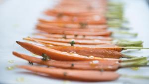 a row of hot dogs on skewers on a table at Taubers Bio Vitalhotel in Chienes