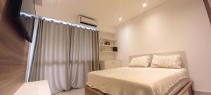 Кровать или кровати в номере Barra Lucio Golden Coast