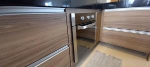 Кровать или кровати в номере Barra Lucio Golden Coast