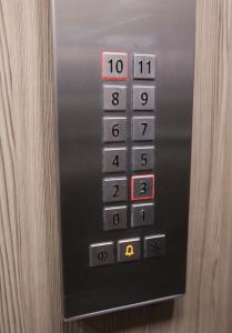 an elevator button with the number ten on it at Vitan Central Oasis - NEW Building - FREE Secured Private PARKING - Self Check-in - in Bucharest +41 photos