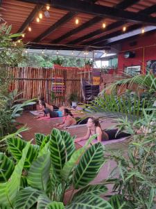 a group of people doing yoga on a patio at Bodhi El Valle in Valle de Anton