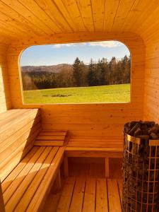 an inside view of a sauna with a window at Apartamenty Arkadia Jaworzynka - Zapasieki in Jaworzynka