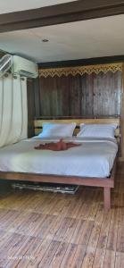 Postel nebo postele na pokoji v ubytování Maya guest house@coffee