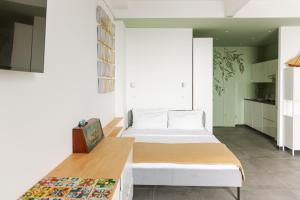 a bedroom with two beds in a room at Cà de Mâ - Sea Front Suite in Genoa +10 photos