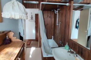 a bathroom with a sink and a shower and a toilet at Casa Madesimo - Impianto sciistico e Parcheggio in Madesimo +20 photos