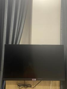 TV in/ali zabaviščno središče v nastanitvi Tree Homestay