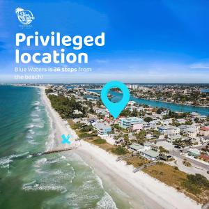 an aerial view of a beach with a blue marker at Blue Waters Treasure Island in Treasure Island