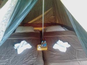מיטה או מיטות בחדר ב-สะปัน ฮิลล์ - Sapan hill