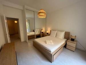 Ένα ή περισσότερα κρεβάτια σε δωμάτιο στο Oasis Palais, city centre, 1 bed