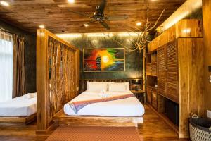 Postel nebo postele na pokoji v ubytování Andalay Beach Resort Koh Libong