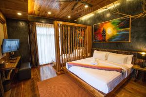 Postel nebo postele na pokoji v ubytování Andalay Beach Resort Koh Libong