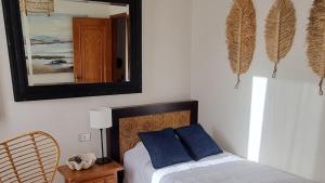 Ένα ή περισσότερα κρεβάτια σε δωμάτιο στο 'Dos Sirenas' Oceanfront Home +13 φωτογραφίες